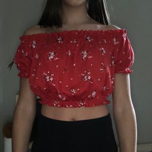 over the shoulder cropped shirt.